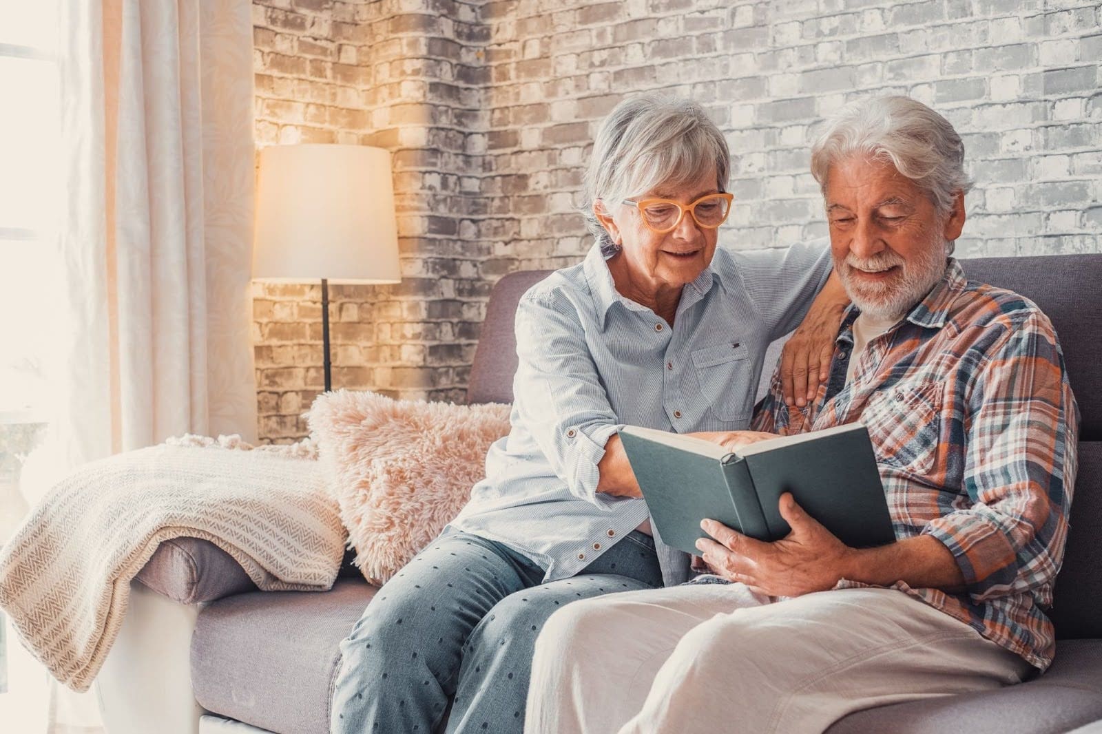 Senior Couple Reading A Book