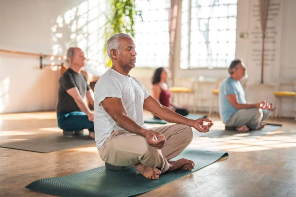 seniors doing yoga